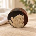 Butt Naked soap with a warm spa-inspired background