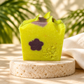 Monkey Farts soap with a bright tropical-inspired background