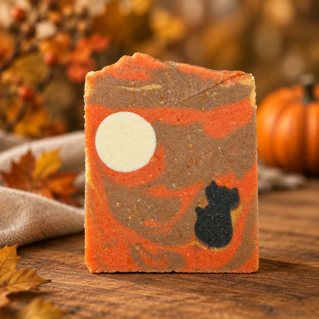 Moon-and-cat soap with a cozy autumn background