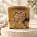 Tallow Confetti soap with a bright cream-and-linen background